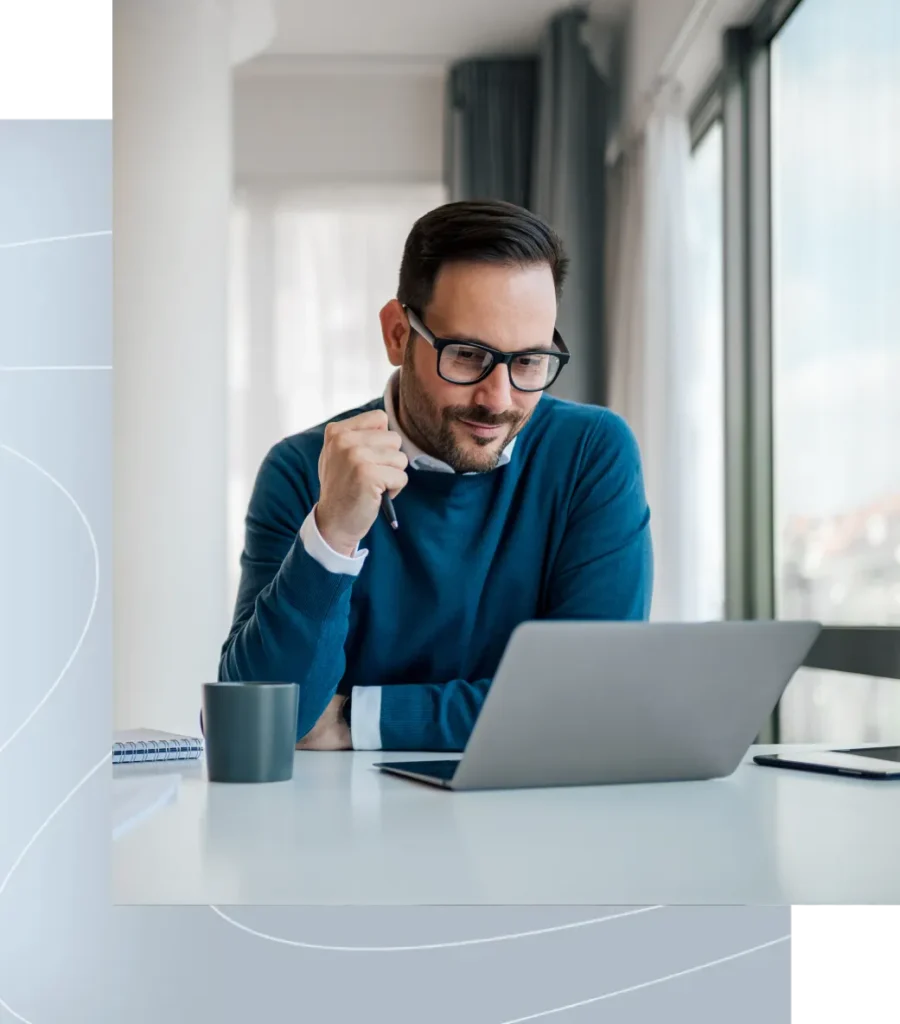 Advisor reviewing his Microsoft Secure Score on a laptop