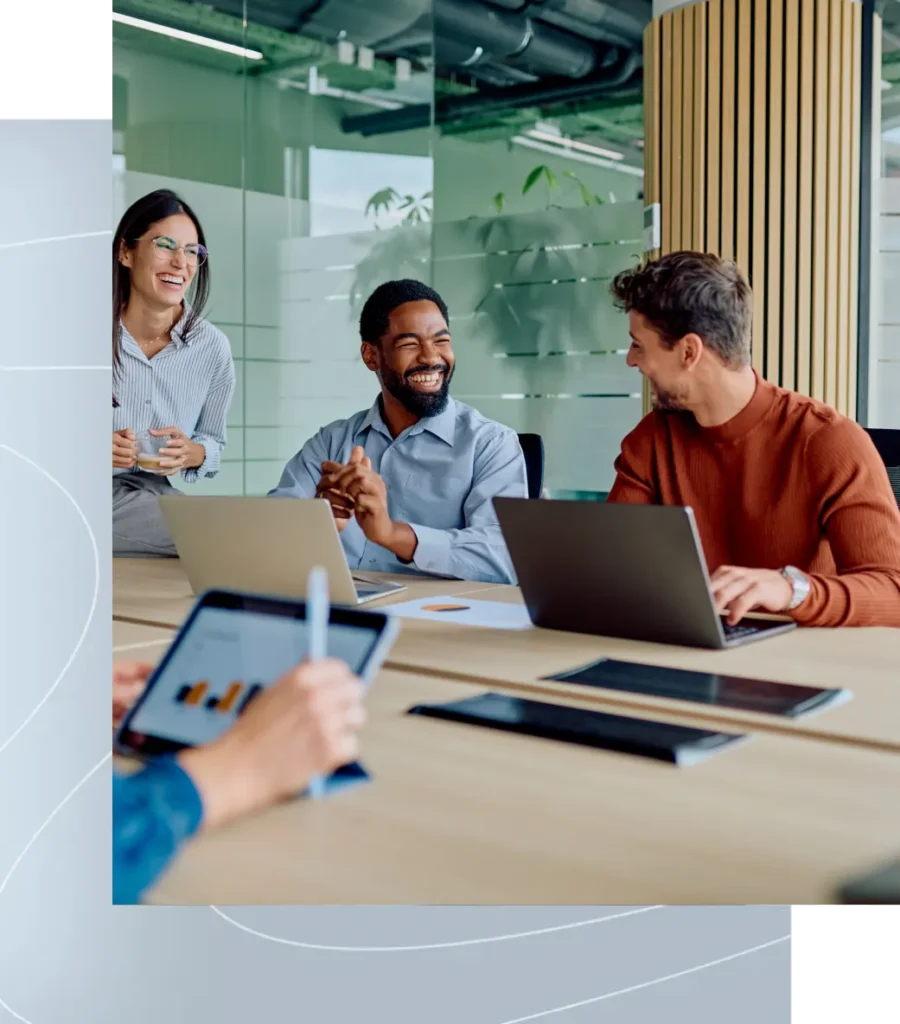 Team discussing Microsoft licensing around a conference table