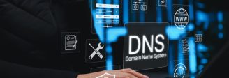 Person using a laptop in a server room with digital DNS, web, security, and network icons overlaid.